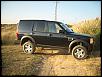 Land Rover Discovery hugs the road.-super-extended.jpg